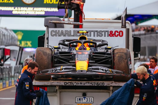 MELBOURNE, AUSTRALIA - APRIL 01: The damaged Oracle Red Bull Racing RB19 of Sergio Perez of Mexico after qualifying at the 2023 Australian Grand Prix at Albert Park in Melbourne, Australia
