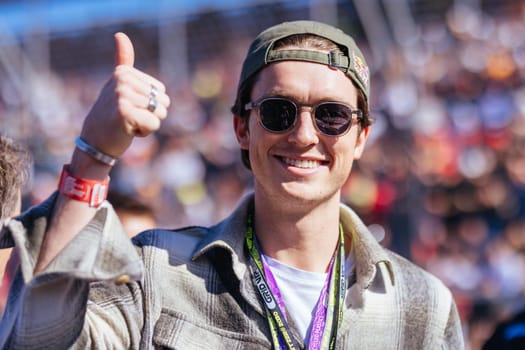 MELBOURNE, AUSTRALIA - APRIL 2: Australian snowboarder Scotty James on the grid before the 2023 Australian Formula 1 Grand Prix on 2nd April 2023