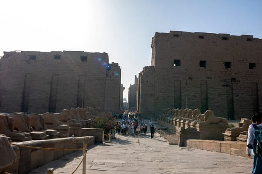 Luxor, Egypt - April 15 2008: Tourists visiting the temple of Amun in Karnak, Luxor, Egypt