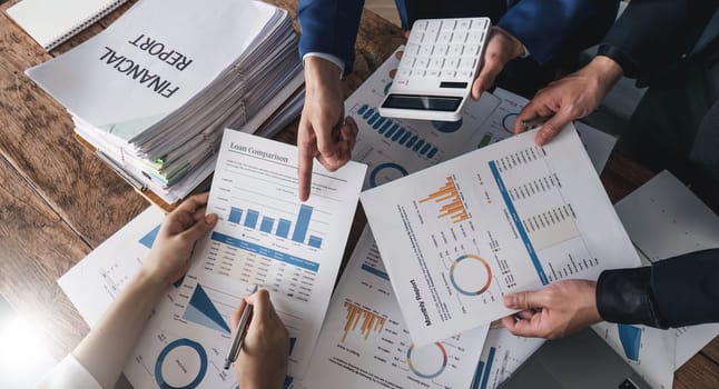 Business financial, accountant discussing with partner are meeting to audit finance planning sales to meet targets set in next year. stock market concept....