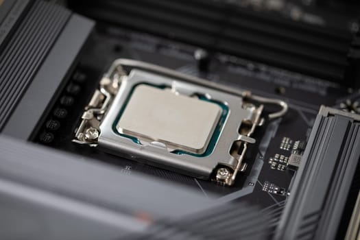 Gently and carefully connecting a new computer part. Purchasing and replacing computer parts to increase the performance of the device. Connecting the new processor to the computer