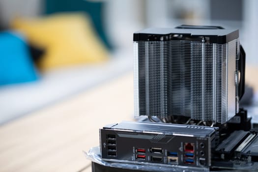 Presentation of computer hardware. The process of replacing old cooling systems with new ones to boost processor performance. Replacing the cooling system in the computer. Passive cooling of the processor.