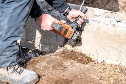 demolition of concrete with an electric hammer.