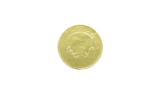 Chocolate gold foil candy coin Kennedy half-dollar showing back eagle symbol on white background. High quality photo