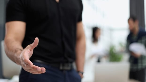 business man offering handshake in office acquisition concept.