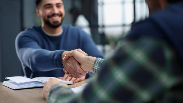 Businessmen Handshaking join to form a startup,