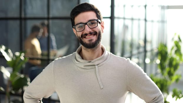 Portrait of a handsome businessman looking at camera