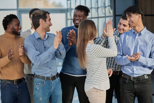 Concept of team work, internationality and success.