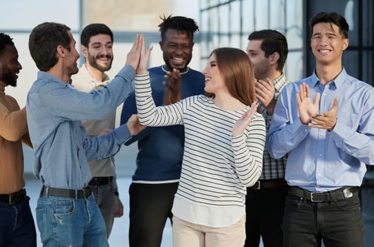 Concept of team work, internationality and success.