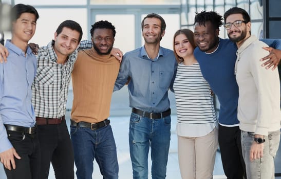 Were all different but as a team we fit together. Portrait of a diverse group of businesspeople in the office.