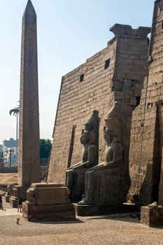 Luxor, Egypt - April 15 2008: The great statues of Ramses II, Karnak, Luxor, Egypt