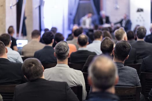 Round table discussion at business convention and Presentation. Audience at the conference hall. Business and entrepreneurship symposium.