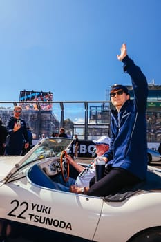 MELBOURNE, AUSTRALIA - APRIL 2: Yuki Tsunoda of Japan driving for Scuderia AlphaTauri at the drivers parade before the start of the main race at the 2023 Australian Formula 1 Grand Prix on 2nd April 2023
