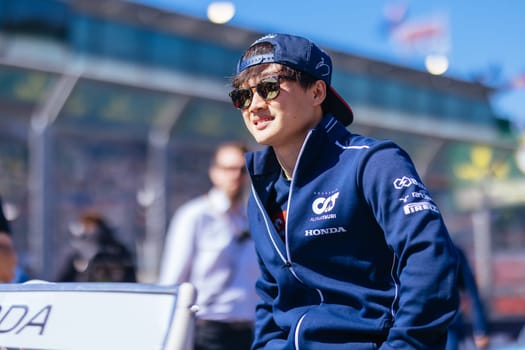 MELBOURNE, AUSTRALIA - APRIL 2: Yuki Tsunoda of Japan driving for Scuderia AlphaTauri at the drivers parade before the start of the main race at the 2023 Australian Formula 1 Grand Prix on 2nd April 2023
