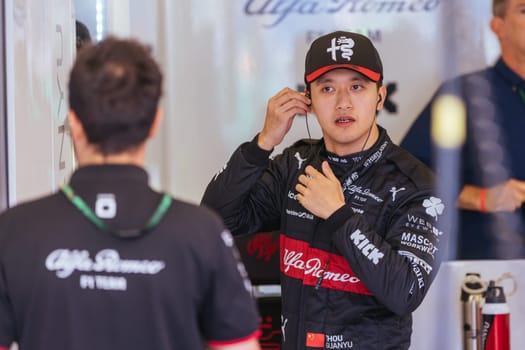 MELBOURNE, AUSTRALIA - APRIL 2: Zhou Guanyu of China who drives the Alfa Romeo F1 C43 Ferrari prepares for race day during the 2023 Australian Grand Prix at Albert Park on April 2, 2023 in Melbourne, Australia.