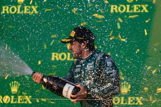 MELBOURNE, AUSTRALIA - APRIL 2: Fernando Alonso of Spain celebrates his 3rd place for Aston Martin Aramco Cognizant Formula One Team on race day during the 2023 Australian Grand Prix at Albert Park on April 2, 2023 in Melbourne, Australia.
