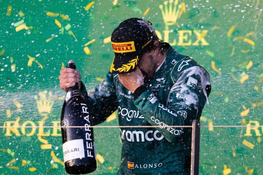 MELBOURNE, AUSTRALIA - APRIL 2: Fernando Alonso of Spain celebrates his 3rd place for Aston Martin Aramco Cognizant Formula One Team on race day during the 2023 Australian Grand Prix at Albert Park on April 2, 2023 in Melbourne, Australia.