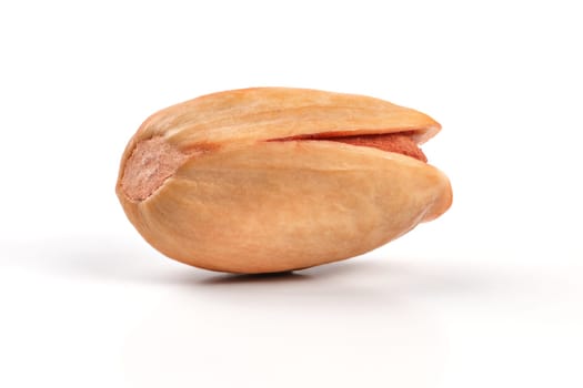 Single turkish red pistachio (Antep) isolated on white background.