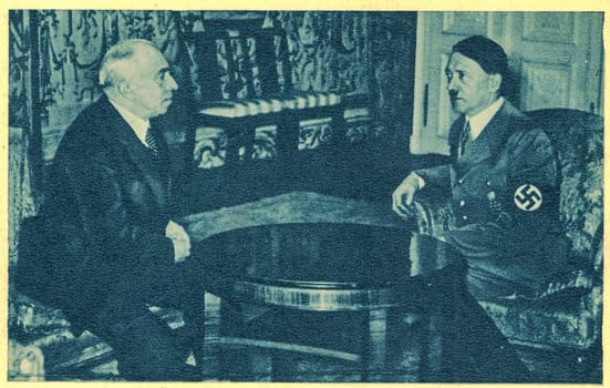 BERLIN, GERMANY - MARCH 14, 1939: Adolf Hitler in conversation with Emil Hacha. March 15, 1939, Hacha signed a document with which he placed the fate of the Czech people and country in the hands of the leader of the German Reich.