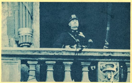 ROMA, ITALY - JUNE 10, 1940: Mussolini announces that Italy is at war from the balcony of the Palazzo Venezia on 10 June 1940. Italian Duce Benito Mussolini - with the support of the King of Italy - appears in public at 18:00 on 10 June 1940 and declares war on Great Britain and France.