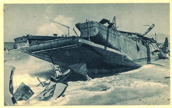 SALERNO, ITALY - SEPTEMBER 1943: Destroyed war ship in Salerno Gulf.