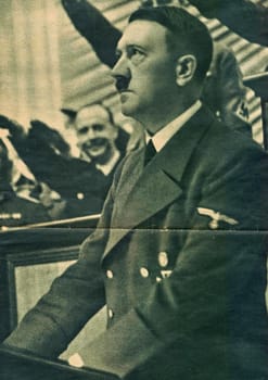 BERLIN, GERMANY - OCTOBER 6, 1939: Adolf Hitler addressed a special session of the Reichstag. After speaking at great length about the victory over Poland he then proposed an international security conference, hinting at desire for an armistice by saying that such a conference would be impossible "while cannons are thundering