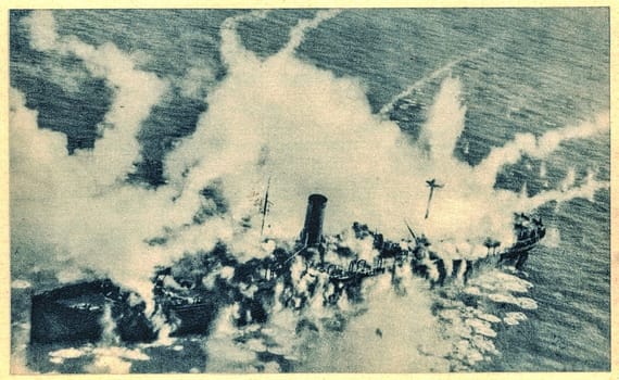 GERMANY - CIRCA 1943: German coastal war ship after Allied bombardment. War ship in fire.