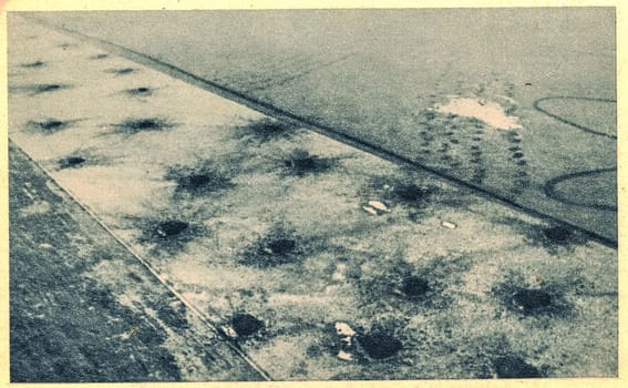 SOVIET UNION - CIRCA 1943: Bombardment of unknown airport by Luftwaffe. Airport in Russia.