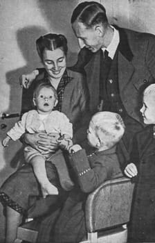 GERMANY - CIRCA 1940: Reinhard Heydrich with his spouse and their three children. From left to right Silke, Heider and Klaus.