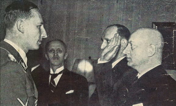 PRAGUE, PROTECTORATE OF BOHEMIA AND MORAVIA - 1941: Emanuel Moravec greets Reinhard Heydrich, Deputy Reich Protector of the Protectorate of Bohemia and Moravia