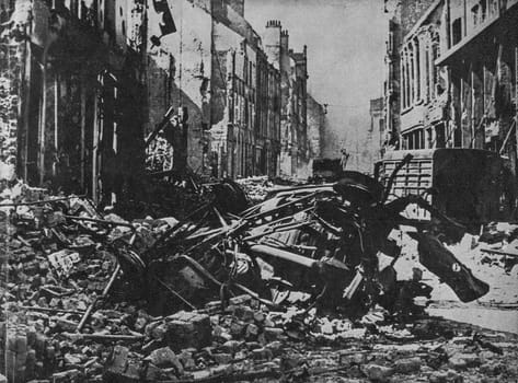 FRANCE - 1940s: Unknown destroyed street and town on north France. Reproduction from fascist magazine. Nazi propaganda.