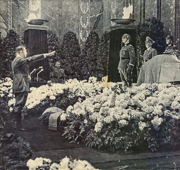 GERMANY - JUNE 9, 1942: After an elaborate funeral held in Prague on 7 June 1942, Heydrich's coffin was placed on a train to Berlin, where a second ceremony was held in the new Reich Chancellery on 9 June. In the photo Hitler salutes on Heydrich's coffin.