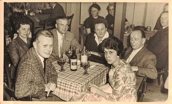 GÜNTERSBERGE, EAST GERMANY - APRIL 18, 1964: The retro photo shows social event. People celebrate . Circa 1960s. The sixties.