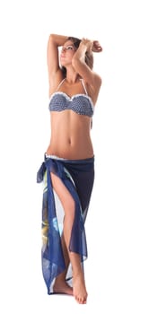 Young girl posing in polka dot bikini with pareo, isolated on white