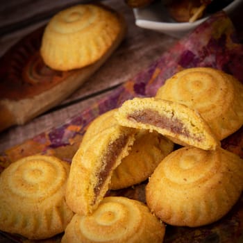 Traditional eid maamoul or mamoul cookies with dates, nuts, and jam, Arabic sweets for Aid al-Fitr and easter, High quality photo