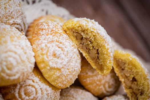 Traditional eid maamoul or mamoul cookies with dates, nuts, and jam, Arabic sweets for Aid al-Fitr and easter, High quality photo