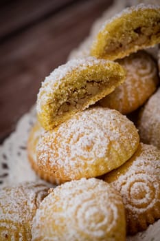 Traditional eid maamoul or mamoul cookies with dates, nuts, and jam, Arabic sweets for Aid al-Fitr and easter, High quality photo
