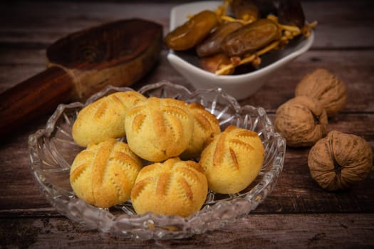 Traditional eid maamoul or mamoul cookies with dates, nuts, and jam, Arabic sweets for Aid al-Fitr and easter, High quality photo