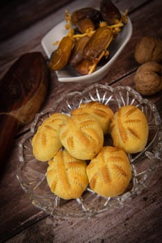 Traditional eid maamoul or mamoul cookies with dates, nuts, and jam, Arabic sweets for Aid al-Fitr and easter, High quality photo