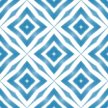Ikat repeating swimwear design. Blue symmetrical kaleidoscope background. Textile ready beautiful print, swimwear fabric, wallpaper, wrapping. Summer ikat sweamwear pattern.
