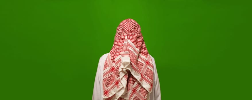 reverse side of Islam, using back view of man in Arabic clothes. hidden and unknown aspects of Islamic culture, inviting viewer to explore enigmatic and spiritual dimensions of religion. High quality photo