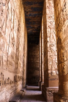 Luxor, Egypt - April 16 2008: The funerary temple of Ramses II in the archaeological site of Medinet Habu, Luxor, Egypt