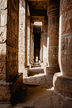 Luxor, Egypt - April 16 2008: The funerary temple of Ramses II in the archaeological site of Medinet Habu, Luxor, Egypt