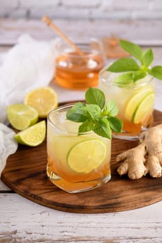   Refreshment organic non-alcohol cocktail. Honey ginger lemonade with a touch of basil flavor