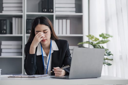 asian woman thinking hard concerned about online problem solution looking at laptop screen, worried serious asian businesswoman focused on solving difficult work computer task...