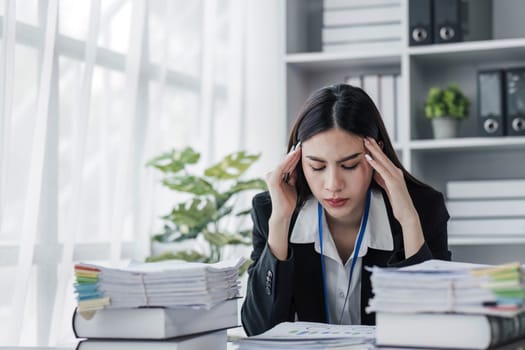 asian woman thinking hard concerned about online problem solution looking at laptop screen, worried serious asian businesswoman focused on solving difficult work computer task...