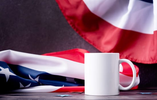 Fourth of july celebration. Blank white cup for mockup design over USA flag background