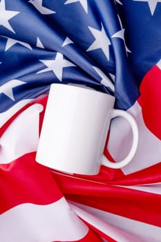 Fourth of july celebration. Blank white cup for mockup design over USA flag background