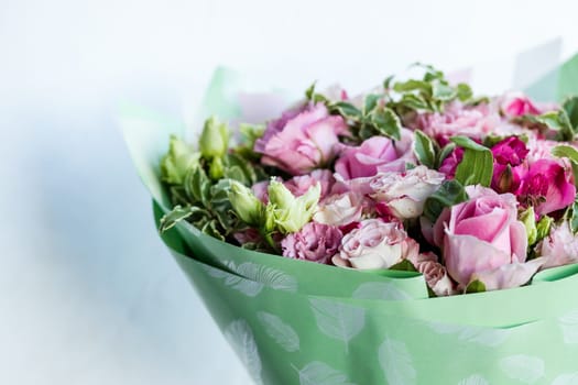 Large Beautiful bouquet of mixed flowers Pink and white color. the work of the florist at a flower shop. Delicate Pastel color. Fresh cut flower.
