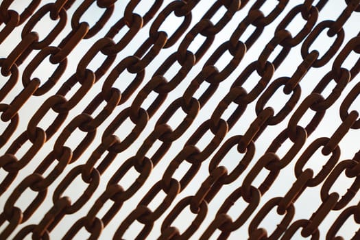Rusty chains isolated on white. black and white concept. Background of chains on a withe background. Rust Anchor Chain. Curtain of old chain-link. Background of metal chains, old used chain.